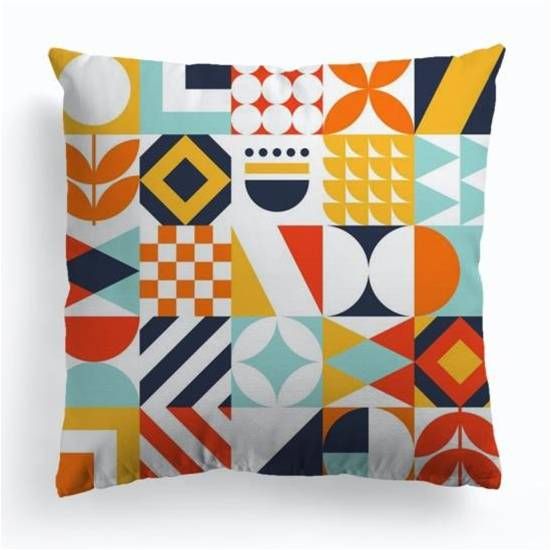 Geometric printed cushion cover in orange, teal and navy