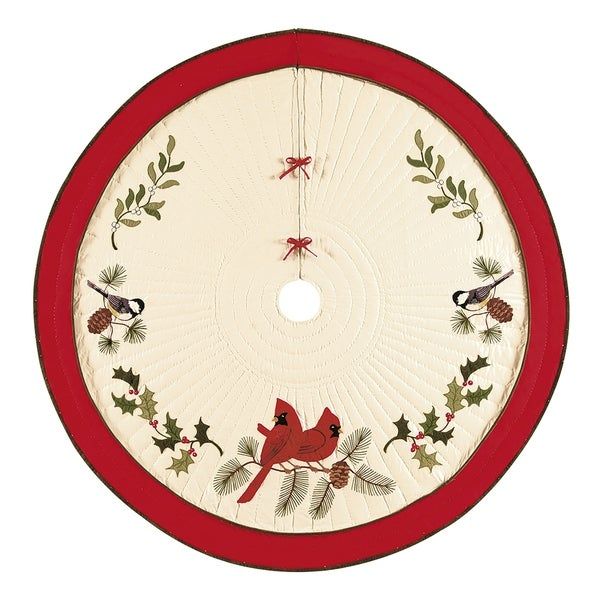 Cream Christmas tree skirt embroidered with a cardinal and pine branches