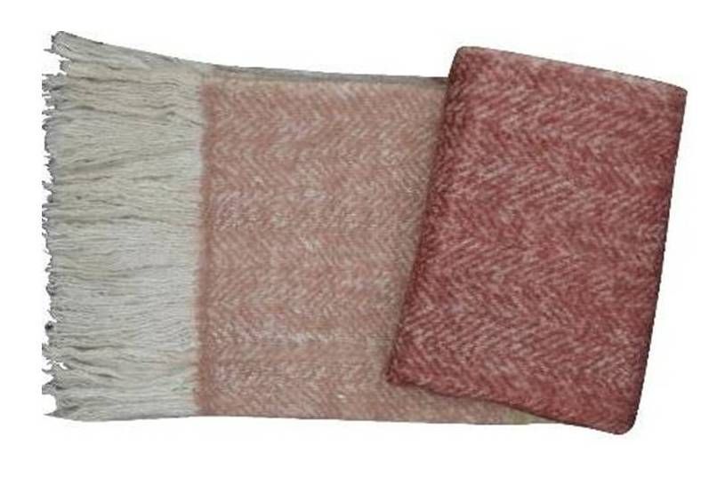 Pink herringbone throw with fringed edges