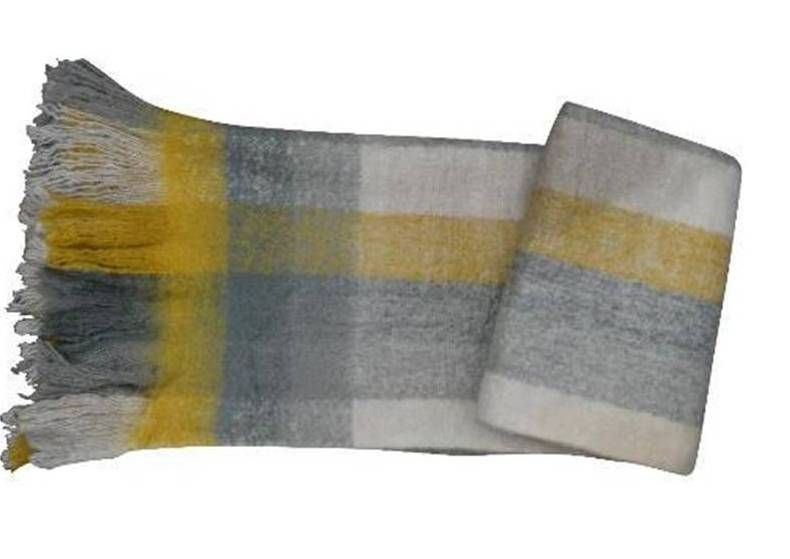 Grey and mustard plaid throw with fringe