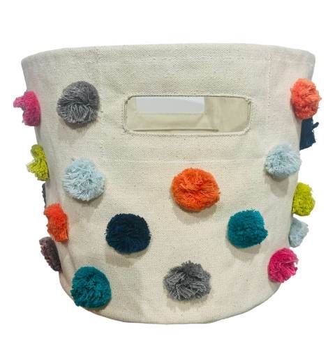 Cream canvas storage bin with colourful pom-poms